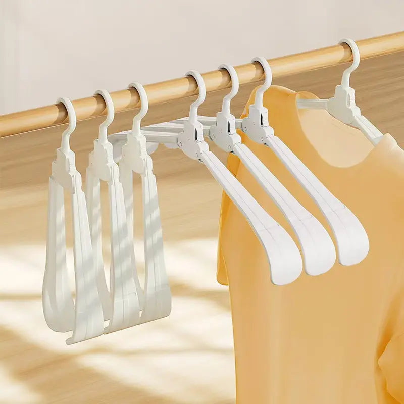 Gancho de Ropa Plegable "Magic Clothes Hook" x12 Unidades